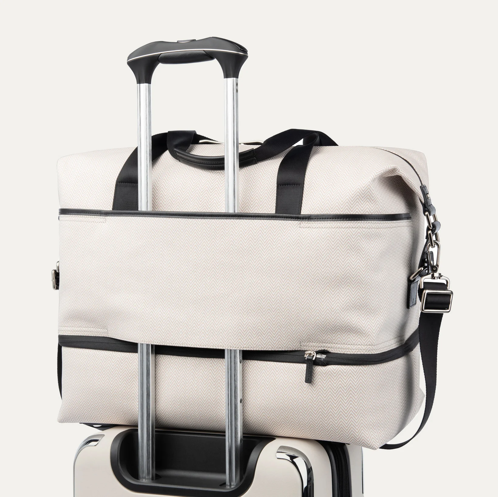 Travelpro® x Travel + Leisure Large Check-in Spinner and Drop-Bottom Weekender Bag Luggage Set - Image 11