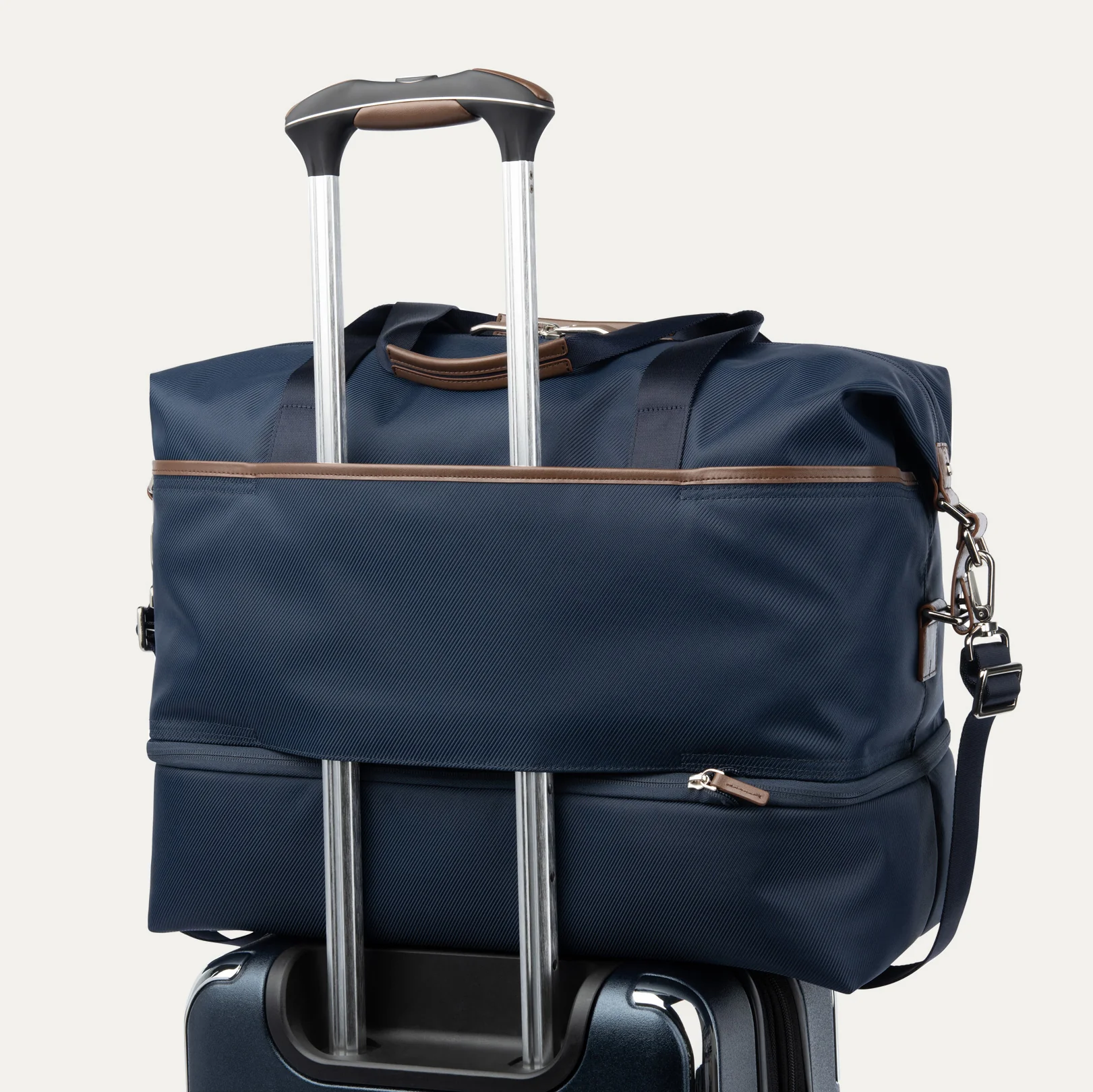 Travelpro® x Travel + Leisure Large Check-in Spinner and Drop-Bottom Weekender Bag Luggage Set - Image 4